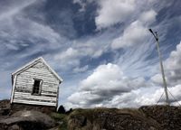 small wooden house on the coast, southern Norway